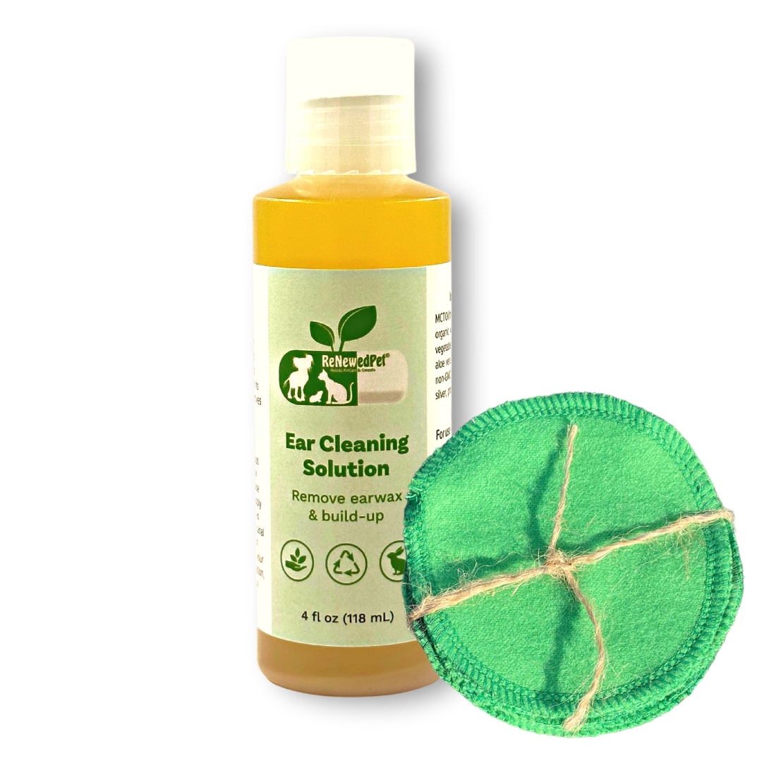 Dog ear cleaning solution bottle with a green cleaning cloth on a white background