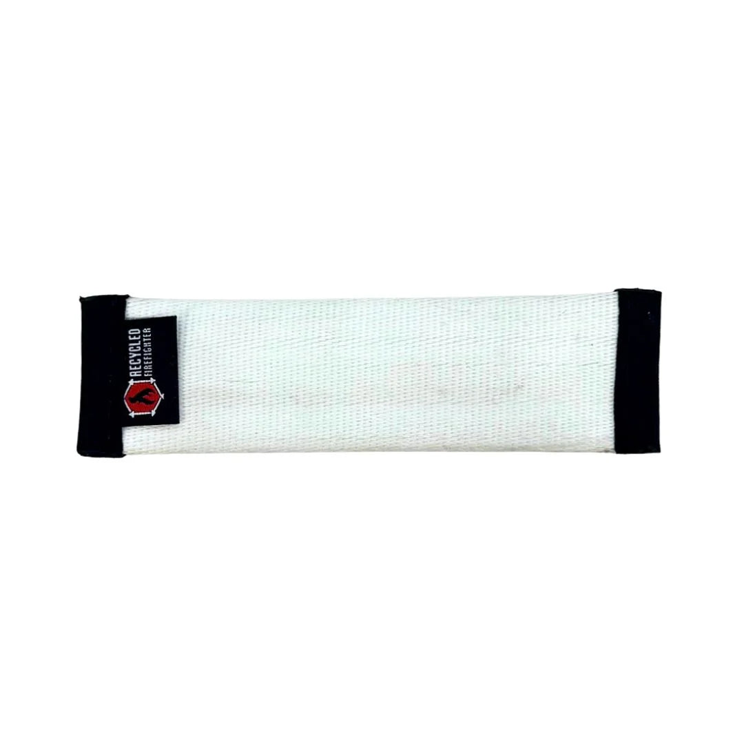 White wrist wrap with black edges and a logo on a white background
