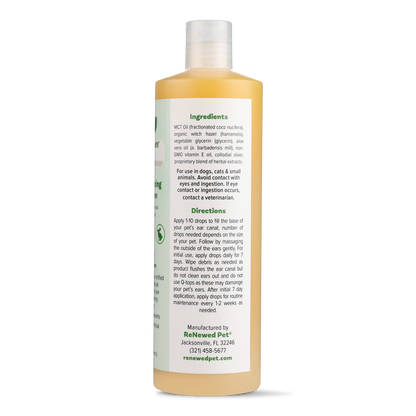 Bottle of pet shampoo with label showing ingredients and directions on a white background